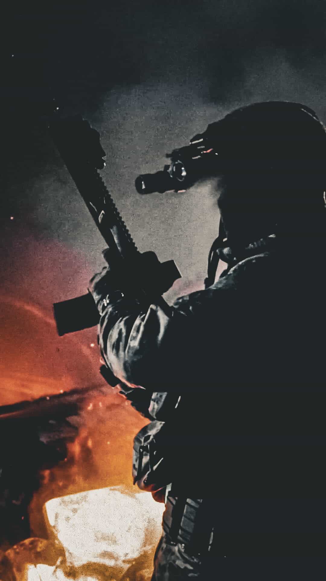 Jugador con visión nocturna iluminado por el fuego, con equipo Brothers in Arms